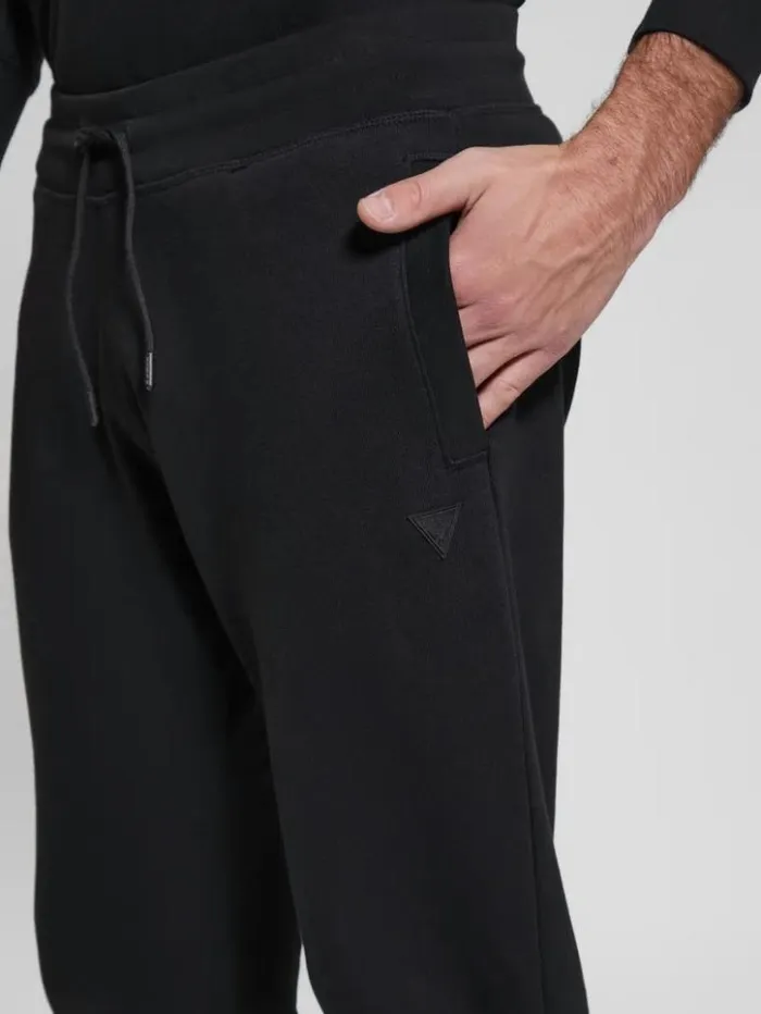 Men GUESS Pants and Shorts Eco Aldwin Logo Pants Black